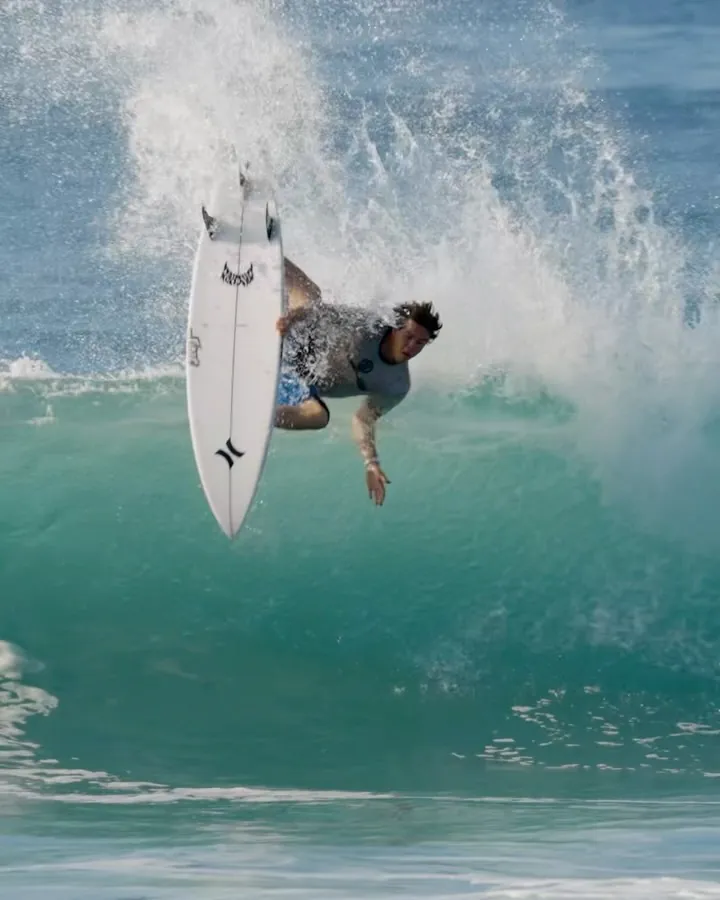 Taj Lindblad boosting off a wave